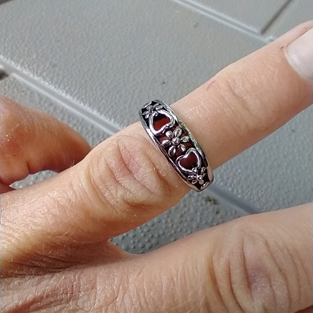 Women's marked S floral ring.